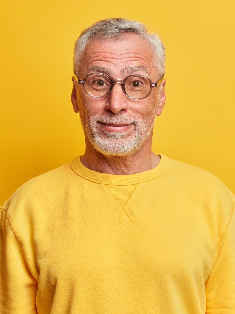 handsome-grey-haired-male-pensioner-has-surprised-cheerful-expression-as-hears-interesting-rumor-or-e1627313563167.jpg